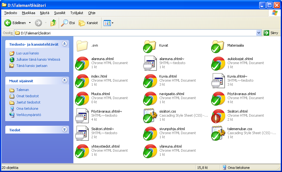 galleryimage:TortoiseSVN Windows XP:ssä. Näytä isoina kuvakkeina.Muutettu tiedosto näkyy huutomerkkinä punaisessaympyrässä.